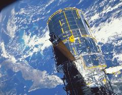 rocketdyne engine sends satellite to space