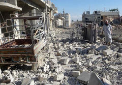 Syria rebels fight on as peace talks pressure mounts